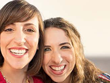 Two women smiling